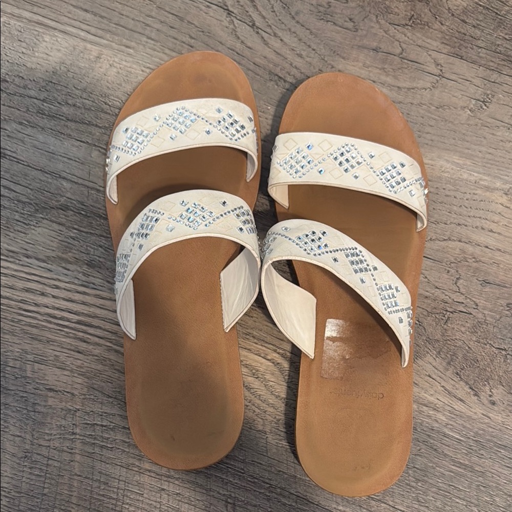 Elegant White and Tan Sandals with Blue Accents